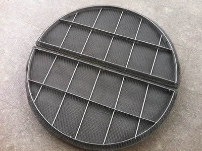 A standard smooth surface type demister pad with flat strip supporting grid on the ground.